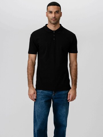 Coupe regular Chemise ' Muscle Polo ' TEESHOPPEN en noir : devant