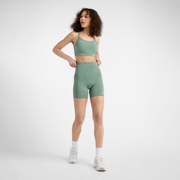 Skinny Pantalon de sport 'Script' new balance en vert