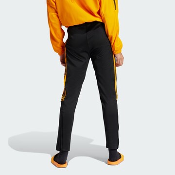 ADIDAS SPORTSWEAR Tapered Sports trousers 'Tiro' in Black