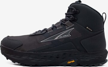 Altra Lace-Up Boots in Black: front