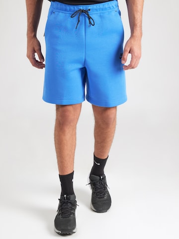 Nike Sportswear Loosefit Byxa 'TECH FLC' i blå: framsida