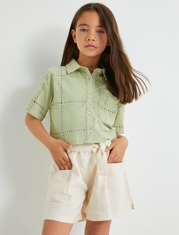 Koton Loose fit Trousers in Beige: front