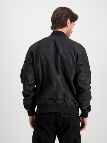 ALPHA INDUSTRIES Φθινοπωρινό και ανοιξιάτικο μπουφάν 'MA-1 TT NASA II' σε μαύρο