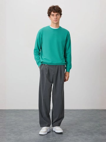 Sweat-shirt Tommy Life en vert