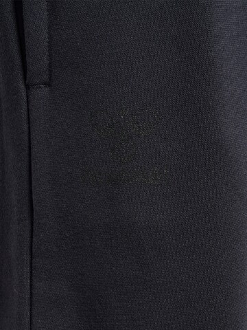 Tapered Pantaloni sportivi di Hummel in nero