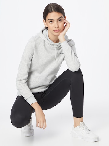 PUMA - Sweatshirt de desporto 'Essential' em cinzento