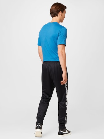Nike Sportswear Ozke Hlače 'Repeat' | črna barva