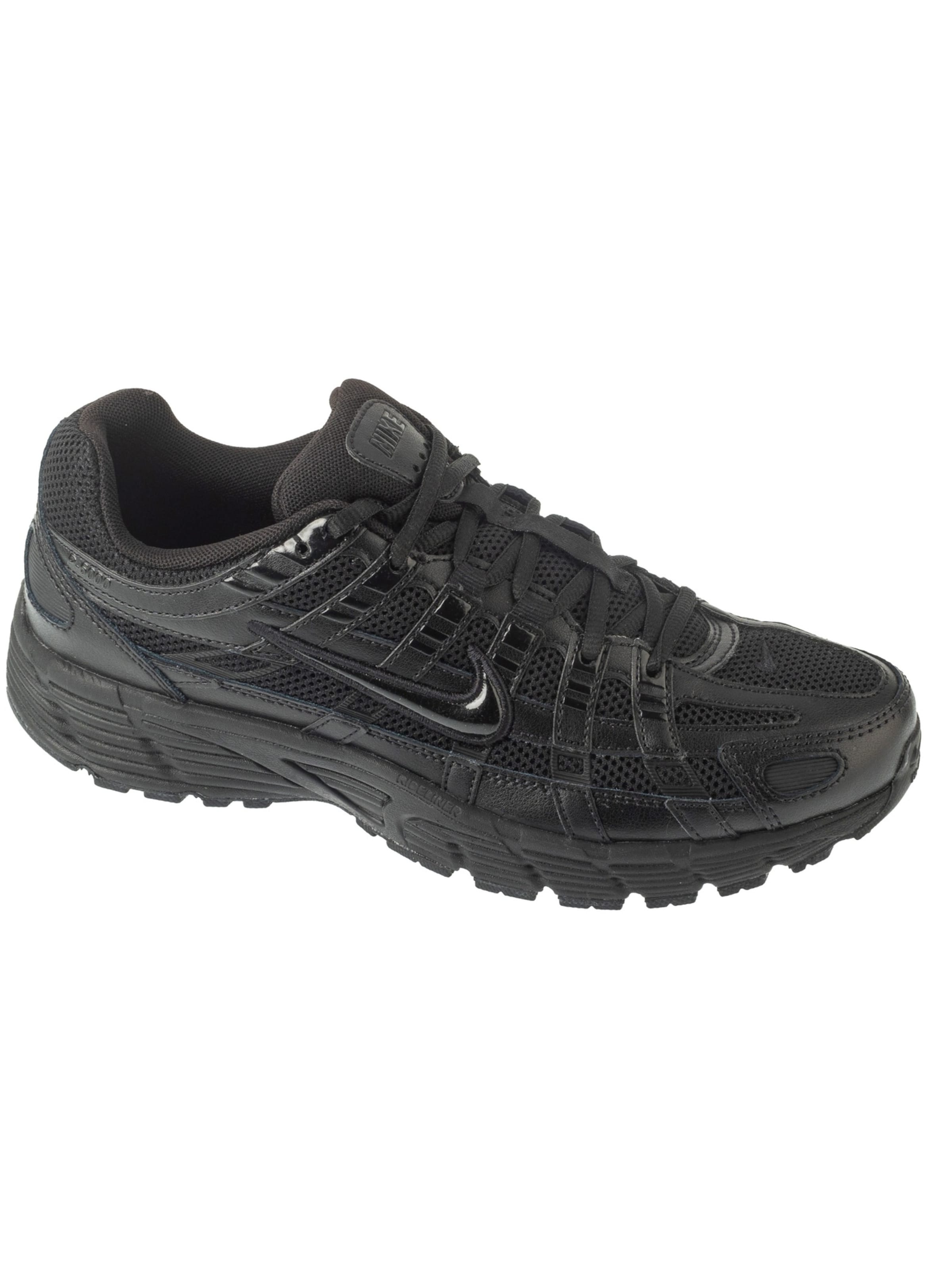 NIKE Sneakers in Black: front