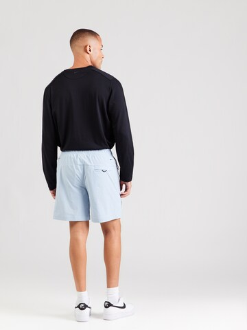Nike Sportswear Loosefit Broek 'TECH' in Blauw