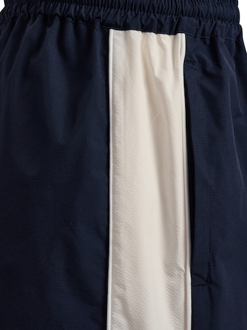 Regular Pantalon de sport Hummel en bleu