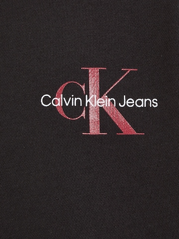 Calvin Klein Jeans كنزة رياضية بلون أسود