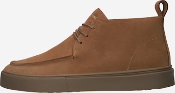 BLACKSTONE - Botines chukka en marrón: frente