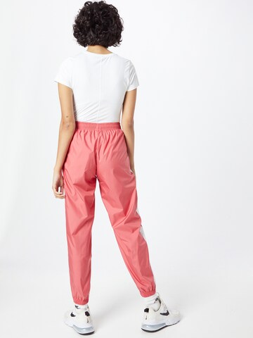 Nike Sportswear Tapered Hose in Pink