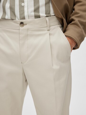 SELECTED HOMME regular Παντελόνι με τσάκιση 'Gibson' σε μπεζ