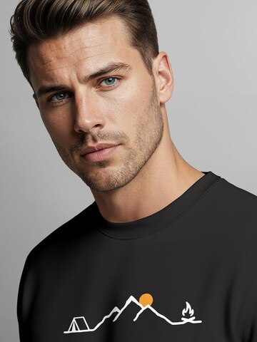 Neverless Sweatshirt 'Tent Campfire'‌‌‌‌‌‌‌‌‌‌ in Schwarz