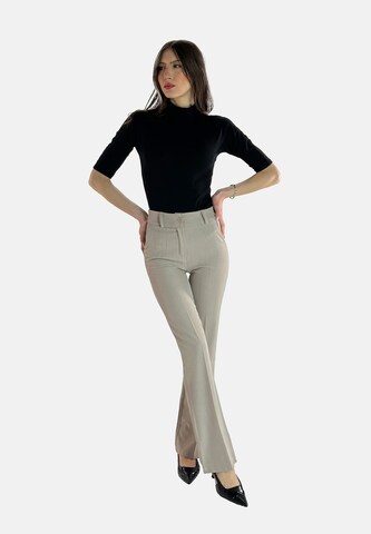Flared Pantaloni con piega frontale di Elara in beige