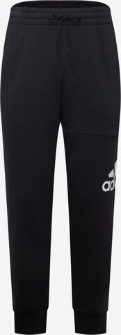 ADIDAS SPORTSWEAR - Tapered Calças de desporto 'Essentials' em preto: frente