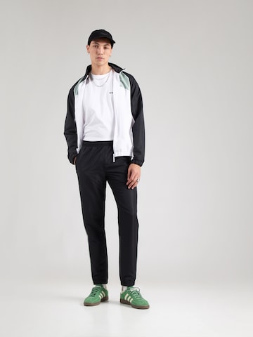 Sergio Tacchini Jooksudress 'Metropolis', värv must