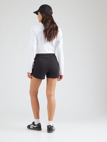 Regular Pantaloni de la Champion Authentic Athletic Apparel pe negru