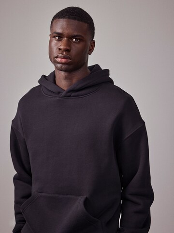 DAN FOX APPAREL Sweatshirt 'The Essential' in Zwart