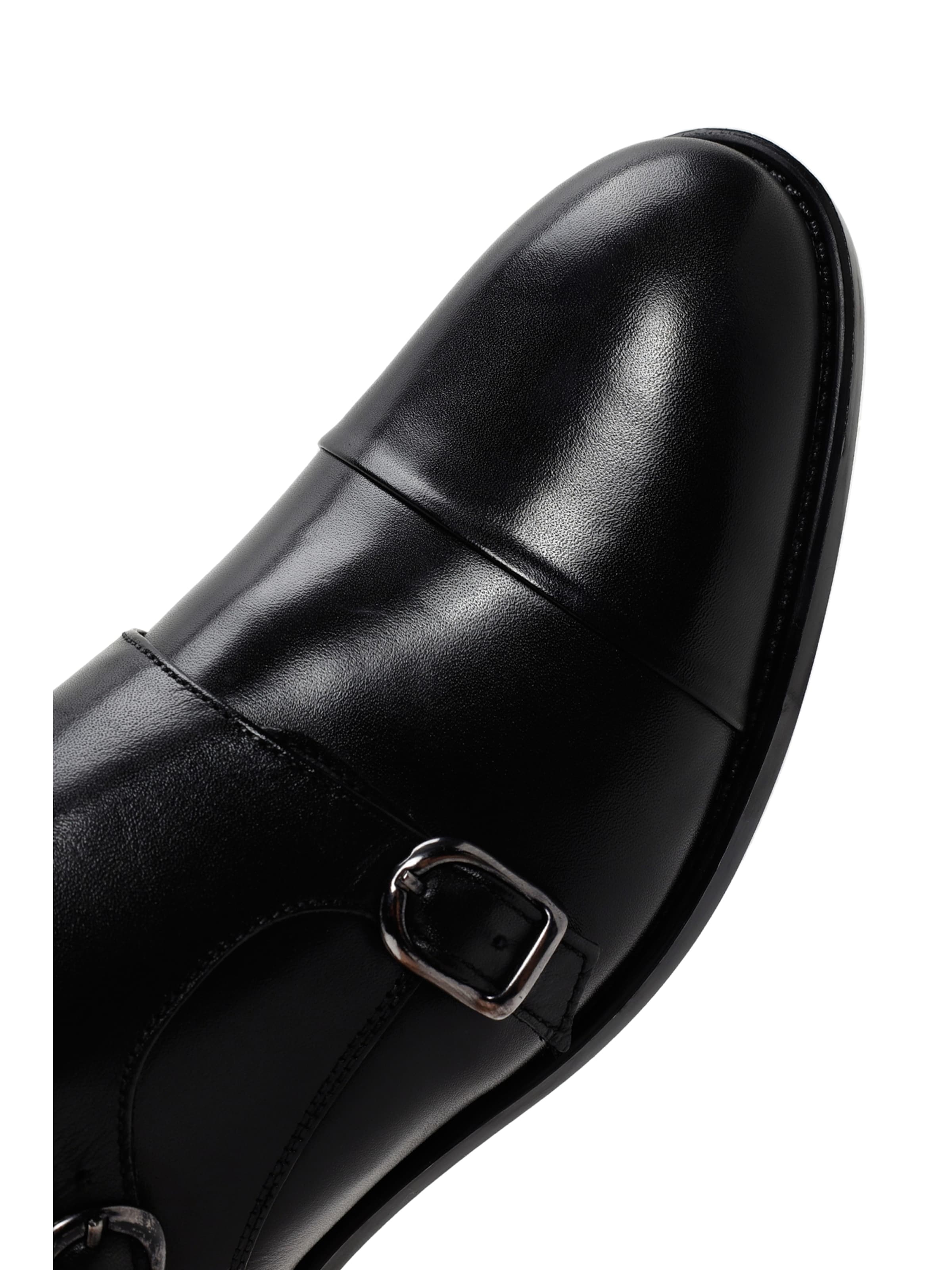 Slipper di Derimod in nero