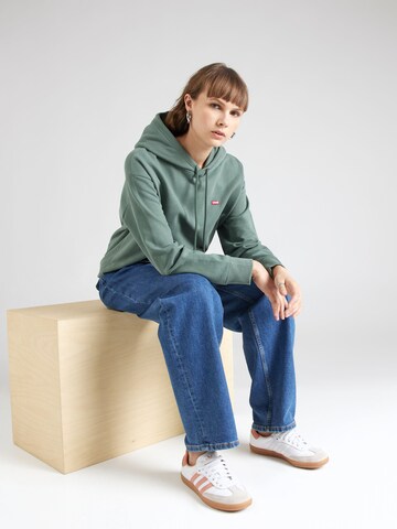 LEVI'S ® Collegepaita 'Standard Hoodie' värissä vihreä