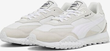 Baskets basses 'Blacktop Rider' PUMA en blanc : devant