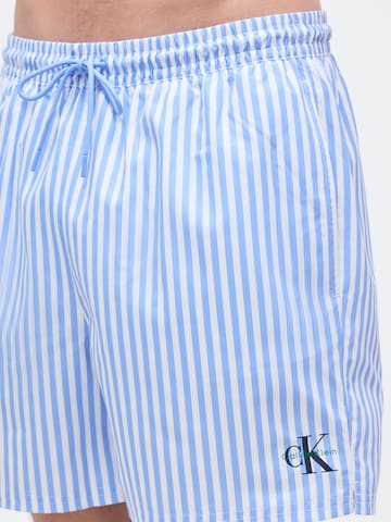Calvin Klein Swimwear Hlače za k noši | modra barva