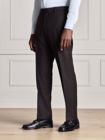 Slimfit Pantaloni con piega frontale di Next in marrone: frontale