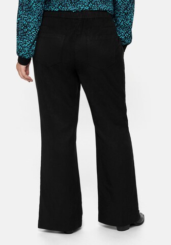 SHEEGO Flared Pants in Black