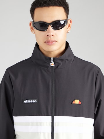 ELLESSE Between-Season Jacket 'Loselli' in Black