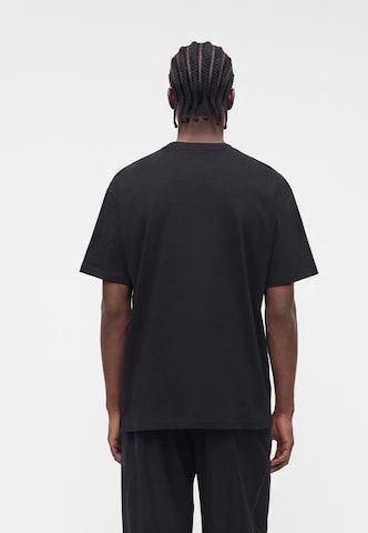 Nike Sportswear Majica | črna barva