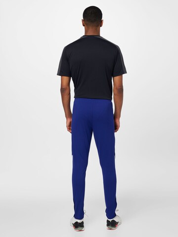 UNDER ARMOUR Skinny Sportsbukser i blå