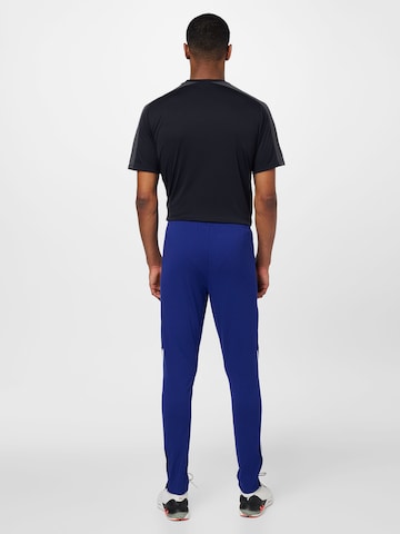 Skinny Pantalon de sport UNDER ARMOUR en bleu
