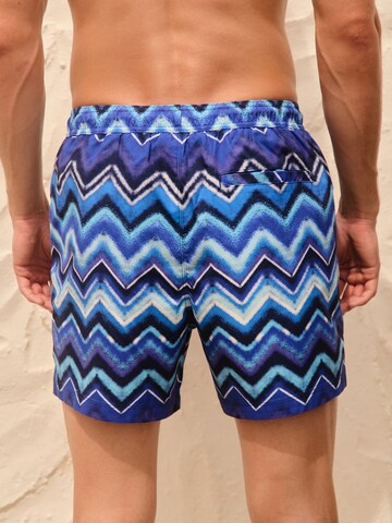 Next Badeshorts i blå
