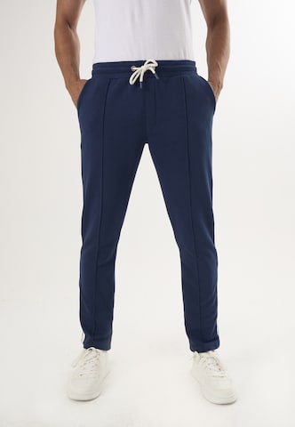 Felix Hardy Regular Trousers in Blue: front