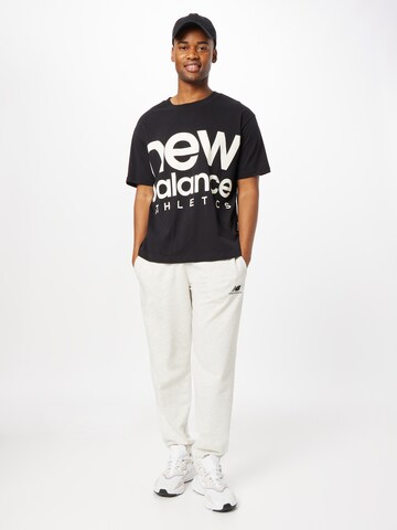 new balance Tapered Sporthose in Weiß