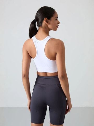 Haut de sport Tommy Life en blanc