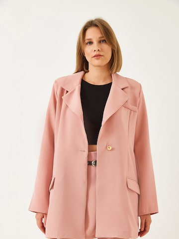 Completo pantalone di Bianco Lucci in rosa