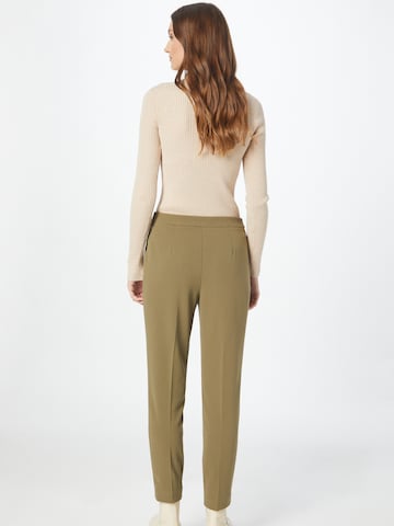 Tapered Pantaloni con piega frontale di Dorothy Perkins in verde