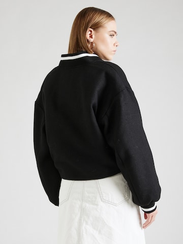 Tommy Jeans Between-Season Jacket 'Varsity' in Black