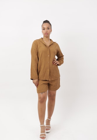 Pantalons de tailleur Elara en marron : devant
