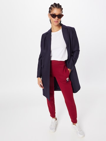 Tapered Pantaloni di TOMMY HILFIGER in rosso