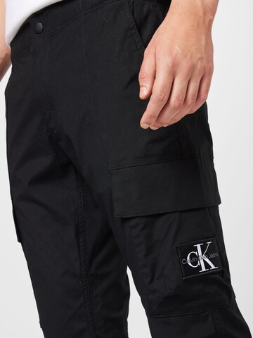 Calvin Klein Jeans Дънки Tapered Leg Карго панталон в черно