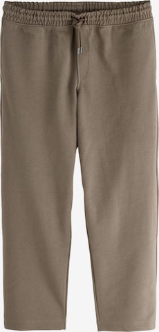 Next Nohavice - Hnedá: predná strana