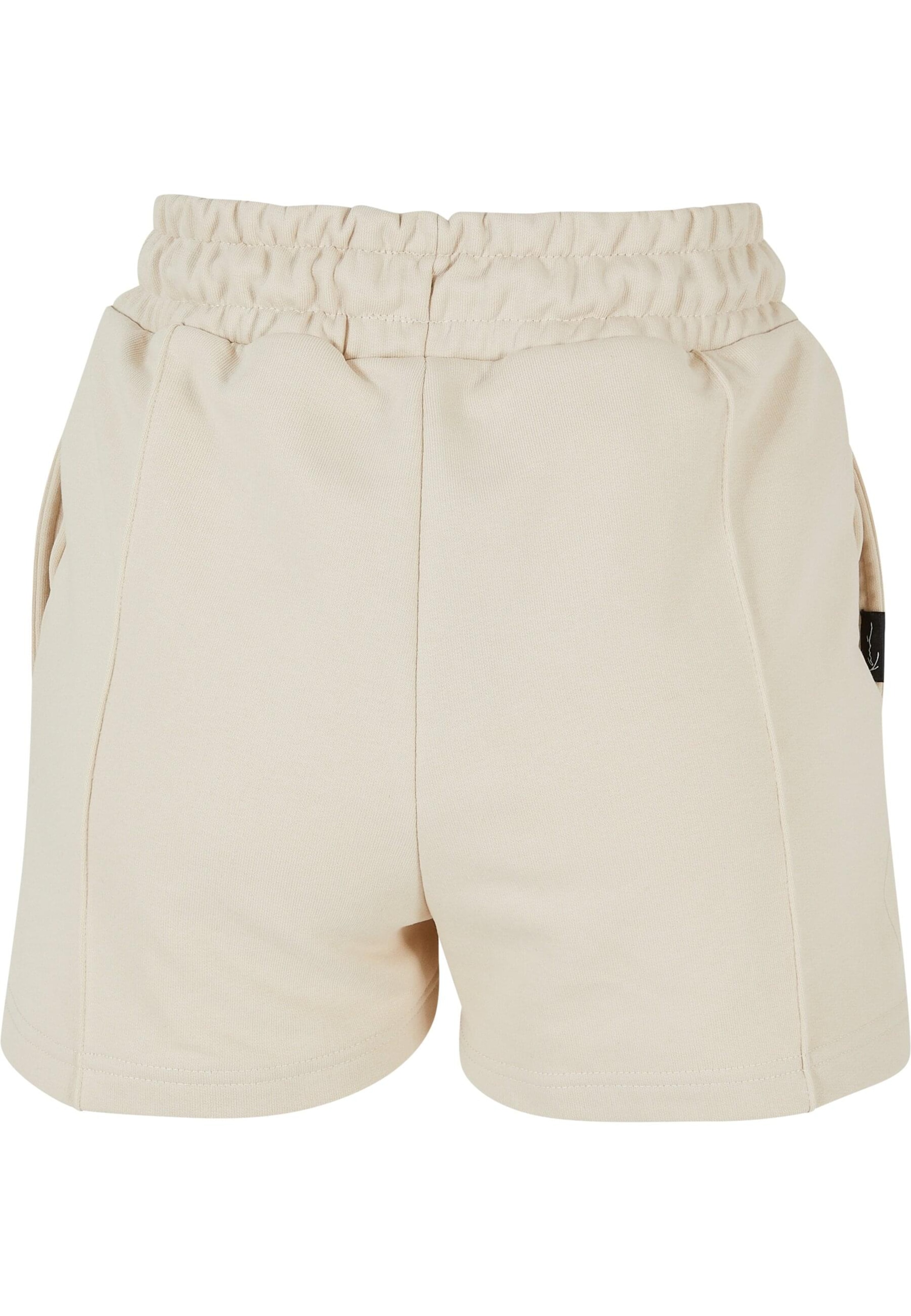 Karl Kani Regular Shorts in Beige