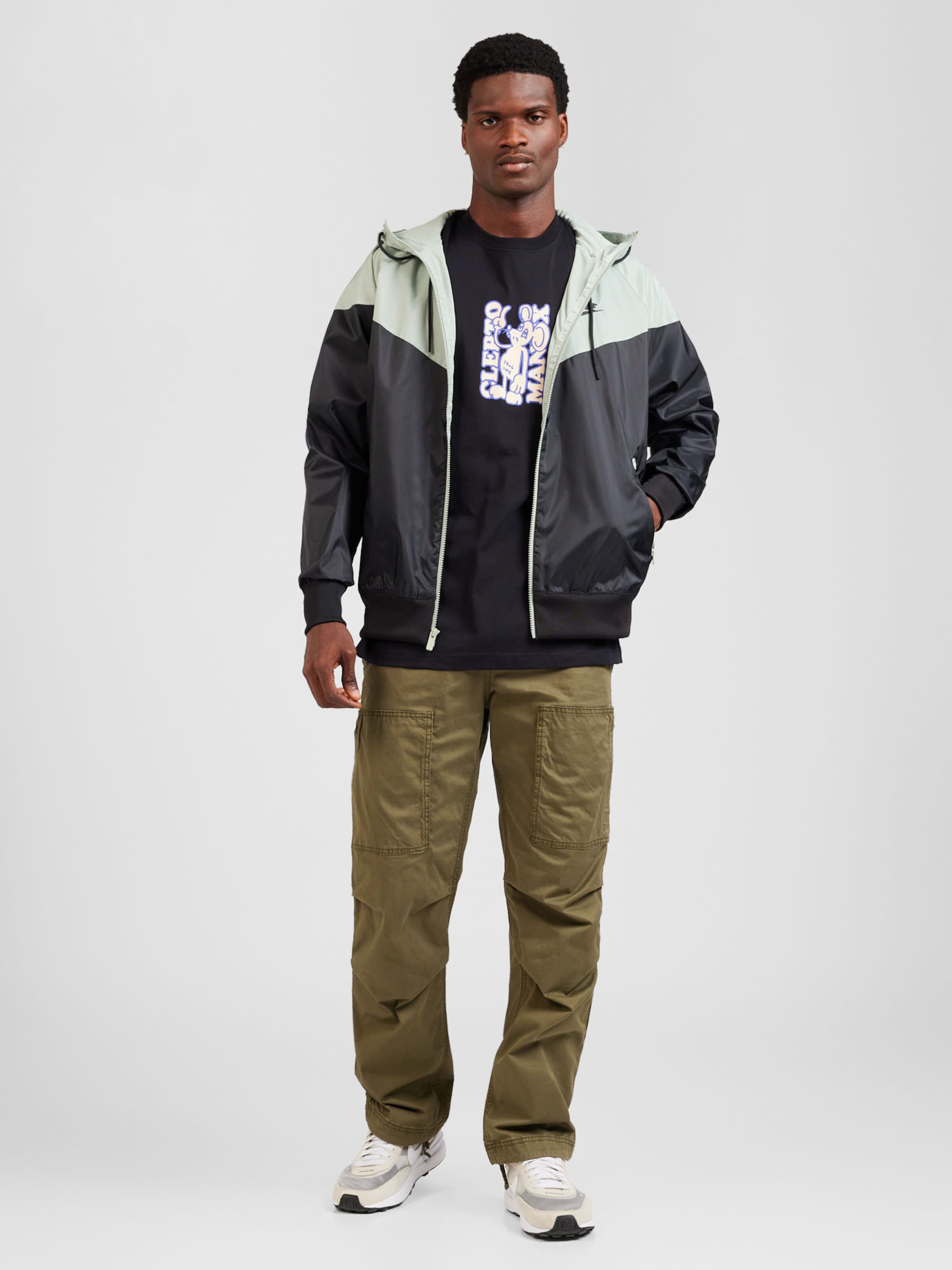 Nike black and green jacket hotsell