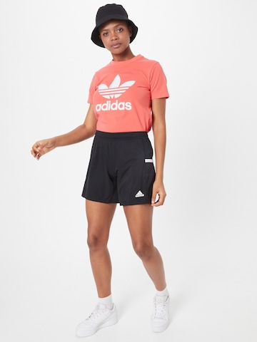 Maglietta di ADIDAS ORIGINALS in arancione