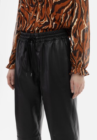 faina Loose fit Trousers in Black