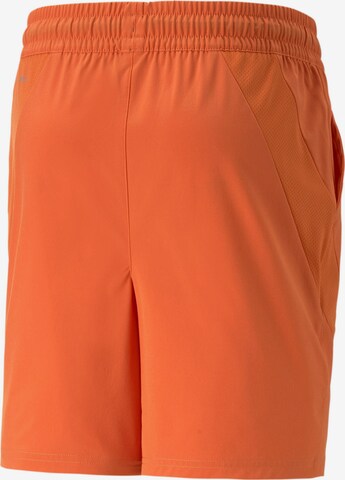 PUMA Regular Sports trousers in Orange